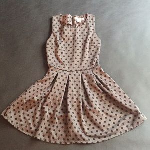 1950s styled polka dot pleated dress